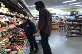 Visually Impaired Person In Grocery Store